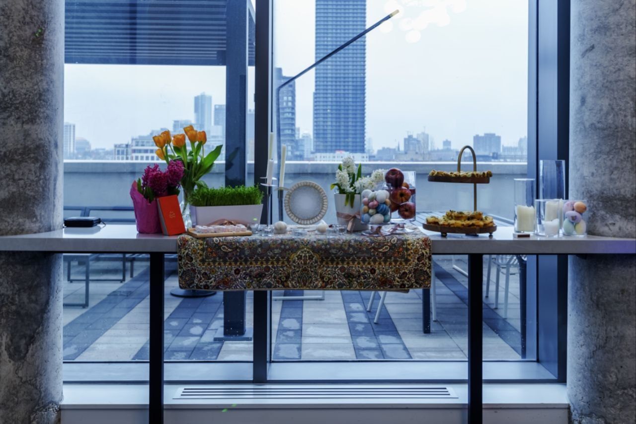 Cultural gathering overlooking an Eastern Canada city skyline