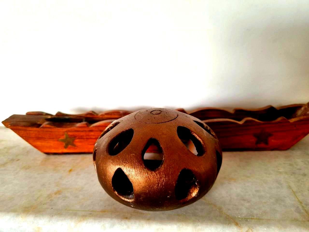 Baked clay covered in acrylic color